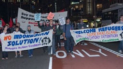 protest Refugee supporters have been shocked by Kevin Rudd's capitulation to Tony Abbott\'s scare campaign about refugee boats